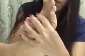 Asian woman self foot worship