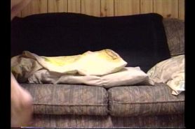 Young guy jerks off and cums on himself