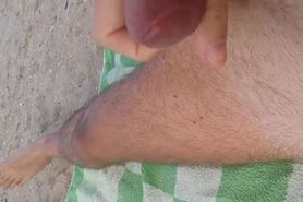 Gay Wanks His Huge Dick and Cums at the Beach