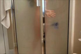 Horny Chick fucks herself in the shower