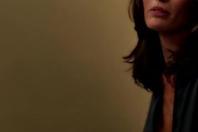 Mom putting on her bra