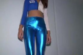 Asian hooker in skintight shiny blue spandex leggings