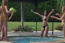 Topless pool girls frolicking in bikinis