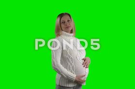 Pregnant woman in white sweater scarf knit