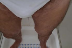 Mature man pissing