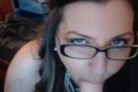 Nerdy Chick with glasses sucking dildo and masturbating