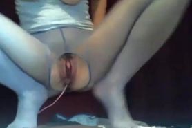 Cam girl squirts in sheer blue pantyhose
