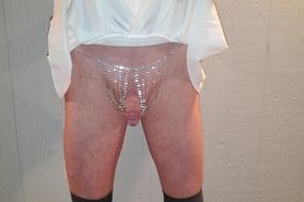 Sissy in skirt and sequin panties with plug