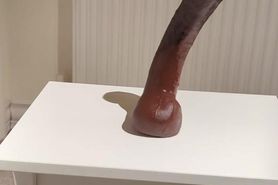 Riding Isaiah Maxwell dildo in heels and stockings