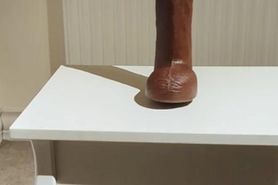 Riding 12inch Anton Harden dildo in heels and stockings