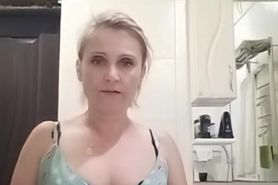 Ksenia is shy about undressing but she enjoys showing o