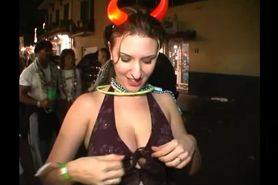 Erin Limmer flashes her big tits at mardi gras
