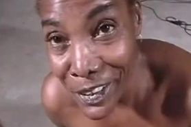 Older ebony sucks cock