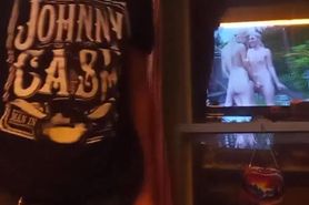 Strip by window with porn on tv