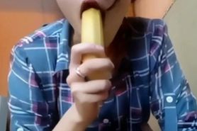 Banana in her ass