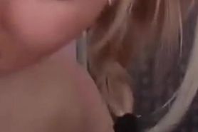 Blonde massaging a cock