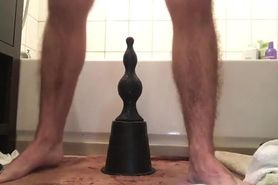 a man sit on big dildo 6357