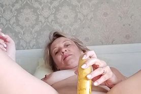 Russian slutty whore Oksana masturbates with a huge ban