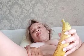 Russian slutty whore Oksana masturbates with a huge ban