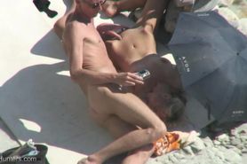 Mutual masturbation on nudist beach