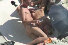 Mutual masturbation on nudist beach