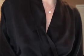 Blonde MILF showing her tits