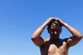 a gay man with big cock on beach 3214