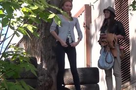 Girls caught peeing behind the warehouse Outdoor spy pe