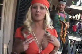 Cristy Alford gives the crowd a topless show