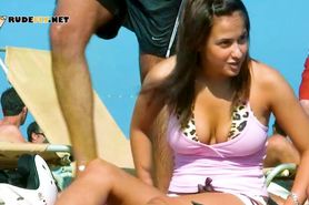 Sexy nude teens play together at a nude beach