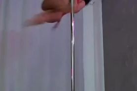 Curly Hair Babe Jumps onto Pole