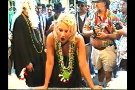 Jennifer Tuttle showing her body off at mardi gras