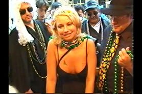 Jennifer Tuttle showing her body off at mardi gras