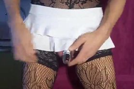 A very large anal plug slides easily into the anus