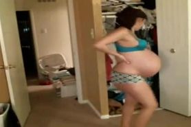 Woman Showing Off Prior To Start of Labor