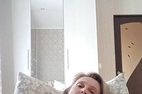 Queen Oksana plays with large eggplant