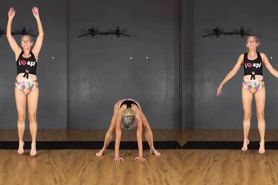 Mature British woman dancing and stretching in bikini