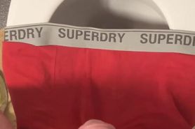 Pissing on a guys used underwear