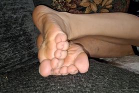 Sexy restless soles on the couch