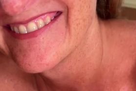 Freckled MILF POV video giving a blowjob