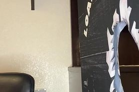 Redhead in pink with serious action through a homemade 