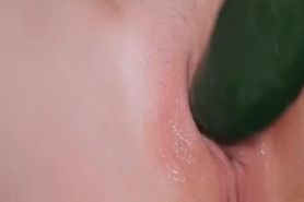 Horny housewife enjoys a large cucumber