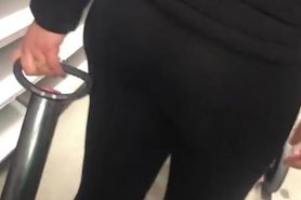 Candid Latina in leggings shopping