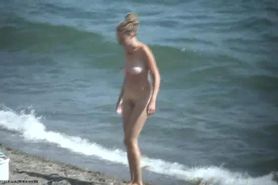 Busty Blonde walking nude on Beach
