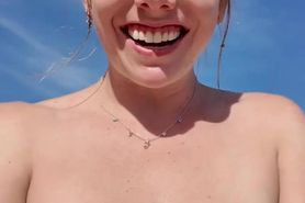 Your horny girlfriend FaceTimes you from the nude beach