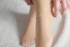 Lady Giulietta wearing beige stockings