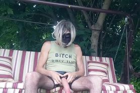 Sissy slut relaxes in the park