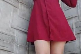 Milf Vicky in a red dress outdoors