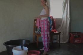 South African bathes her big pale tits