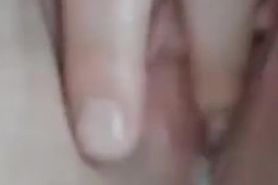 Alison fingers her cunt as her pussy juice drips